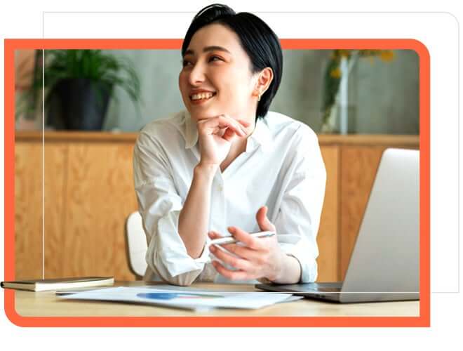 woman closeup at desk looking away