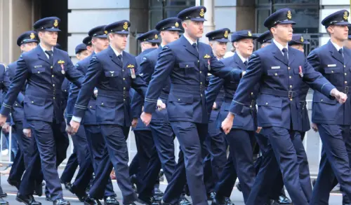 Australian defence group marching in uniform